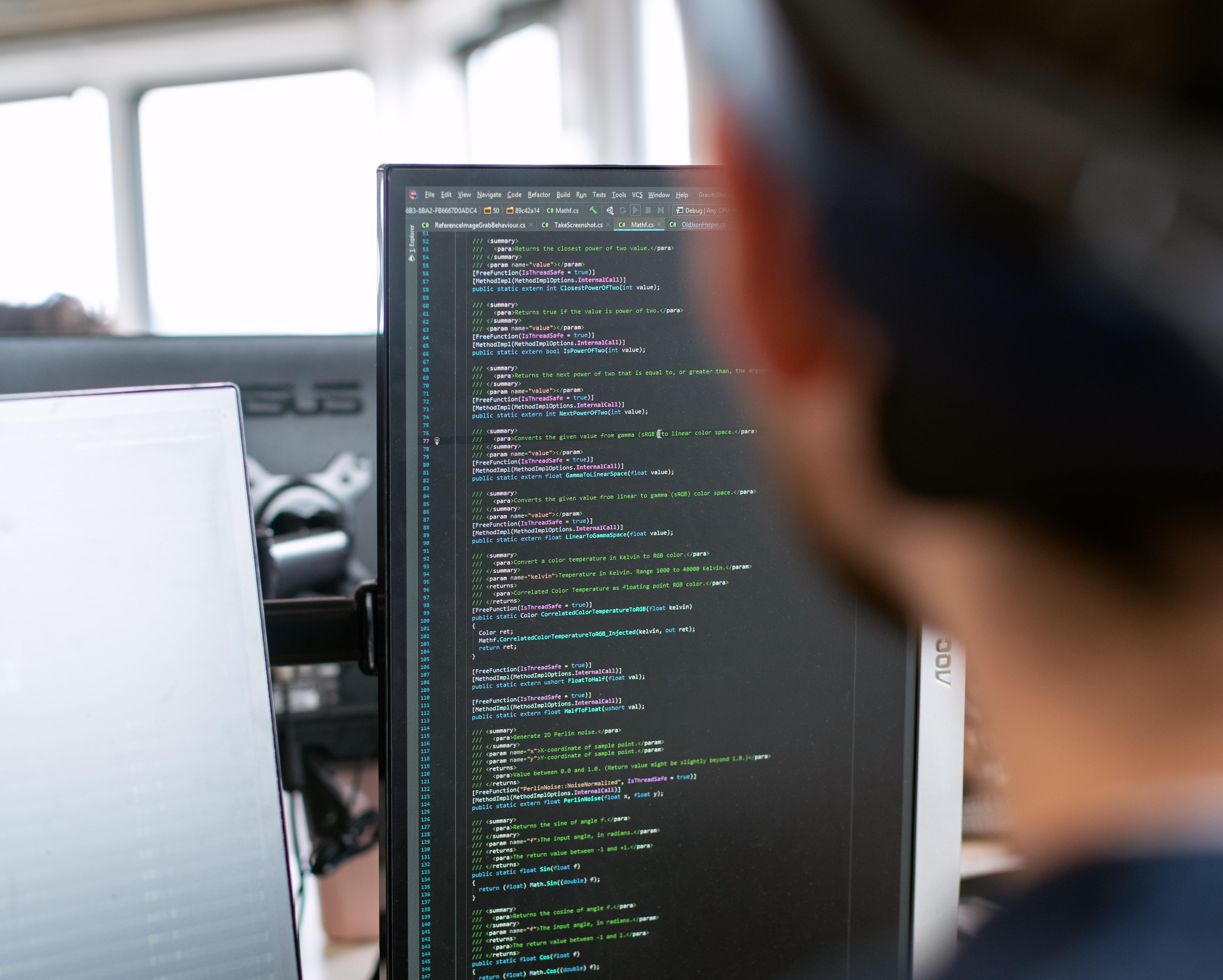 Man coding on computer