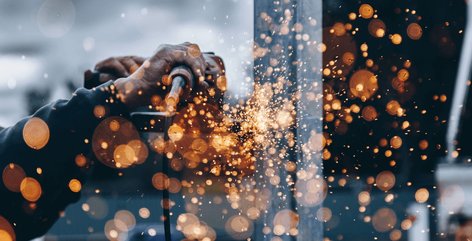 Engineer working, sparks flying